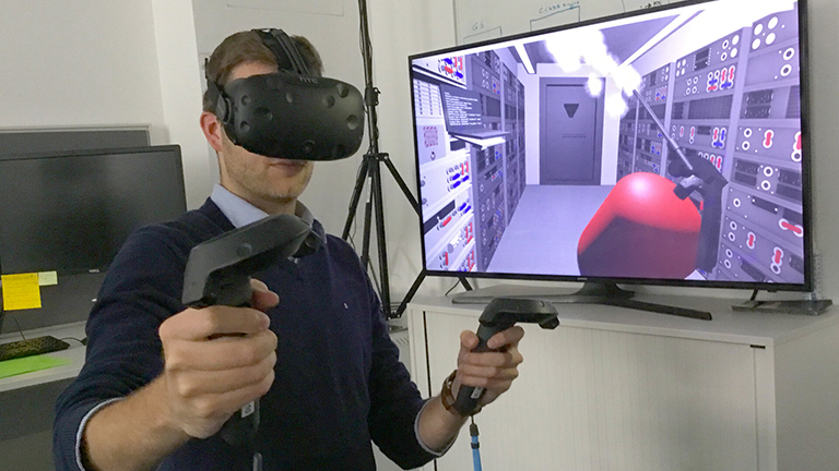 A white man uses a virtual reality simulation