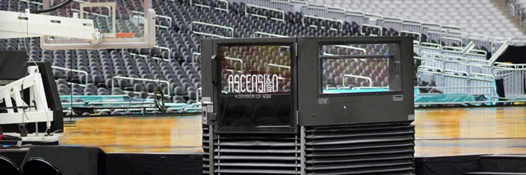 The Ascension Virtuoso wheelchair lift is seen in a basketball stadium